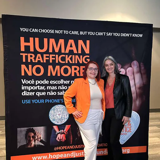 Two guests in front of the awareness panel