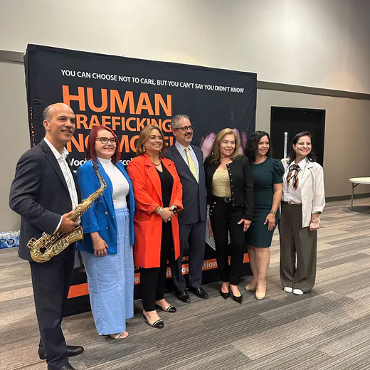 Speakers and guests together in front of the awareness panel